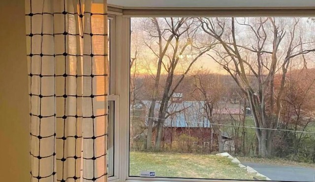 Cheerful two bedroom home in quiet neighborhood. Sun Porch ~ Patio ~ Large yard