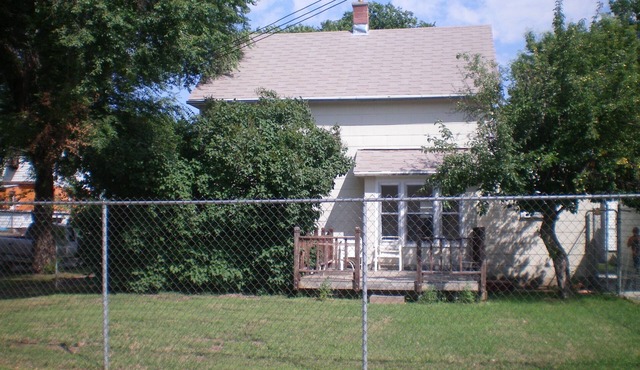 Cozy Nostalgic 2 bedroom, 1 1/2 Bath 2 Story Home With fence, deck & garage.