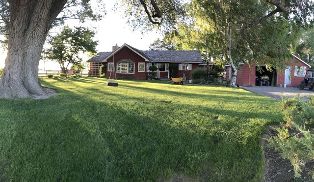 Enjoy peace and quiet on this family farm just minutes from Twin Falls
