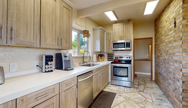 Family-friendly waterview home with firepit, enclosed yard, and W/D
