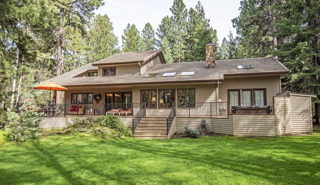 GH219 | Luxury home with a private hot tub and large deck and grassy yard.