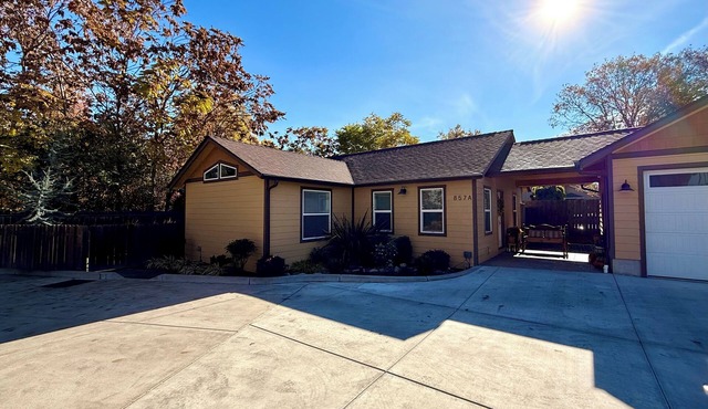 Home with gated driveway near River & Downtown
