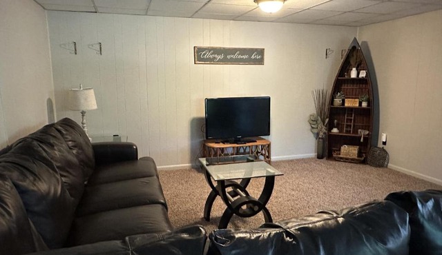 Humble Hideaway - Inviting lakefront home with firepit, balcony & W/D - dog-friendly