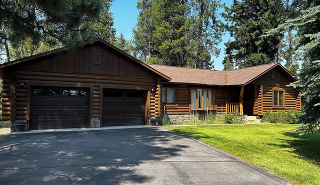 Immaculate log house with backyard view of pond, in Seeley!