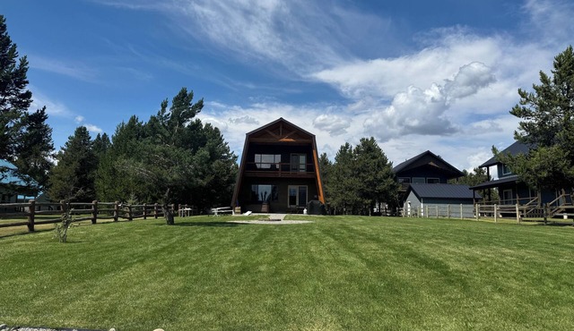 Lakefront 4BR/4BA Cabin with Sauna, Hot Tub & Private Dock – Minutes from YNP!