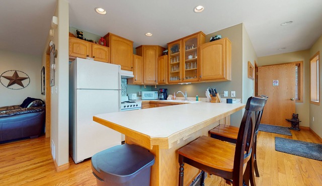 Lakefront getaway with dock, 400- square-foot deck, close to town
