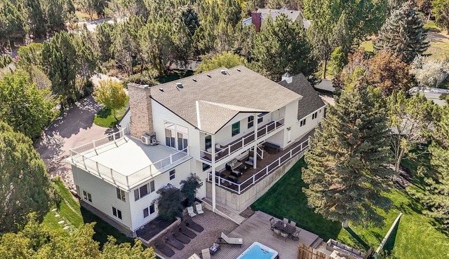 Large luxury home with a pool, playground & a view!