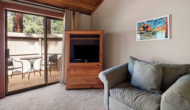 LR029 | Lodge Condo with a King Bed and private fenced in patio.