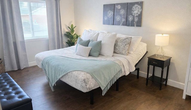 Modern Condo with King Adjustable Base Bed, Sauna, and Gym