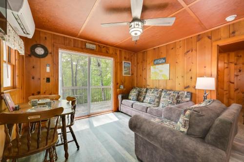 Near Snowmobiling! Carp Lake Cottage w/Fire Pit