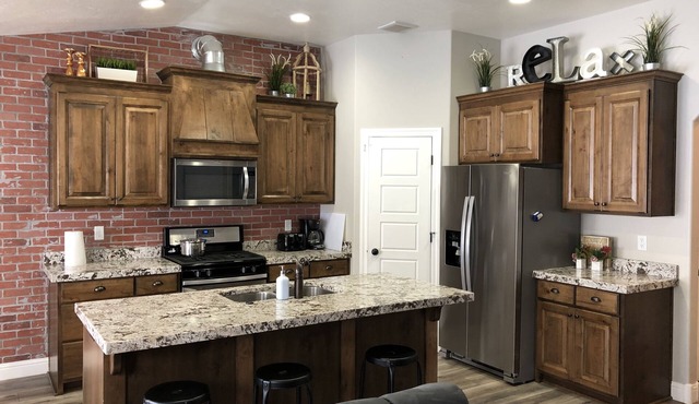 New, stunning retreat, sleeps 8. Hot Tub. Duplex home