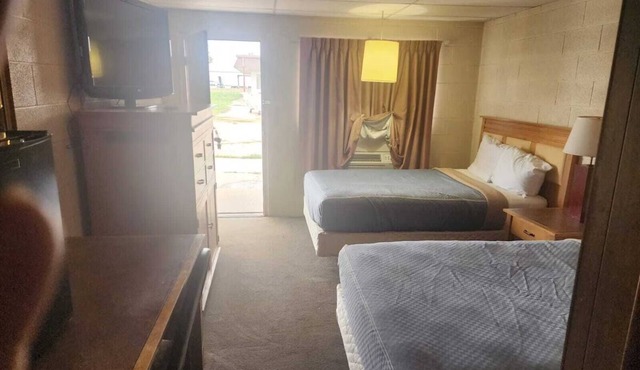 Room with 2 Queen Beds Perfect for Family Road Trips - Explore Chalk Pyramids!