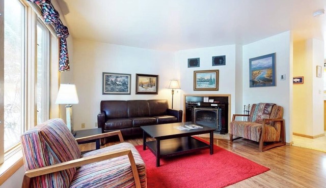 Roomy 2-story home with furnished deck, grill, fireplace, & great location
