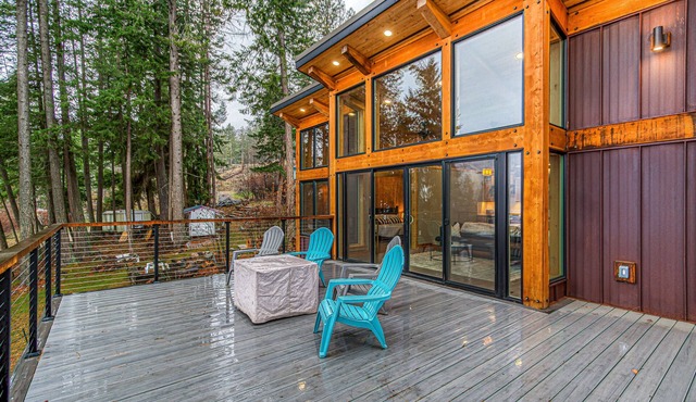 Scenic home with two entrances, mountain & lake views, fireplace, grill & W/D