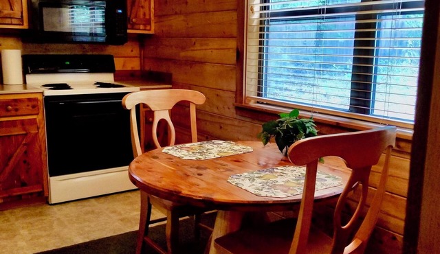 Secluded Hideaway Cabin boasting Wrap-Around Deck and Jacuzzi for two! Trail & Cave on property! in Eureka Springs