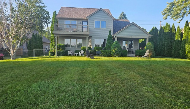 Spacious 5 Bedroom - right on the St. Clair River with private dock and frontage