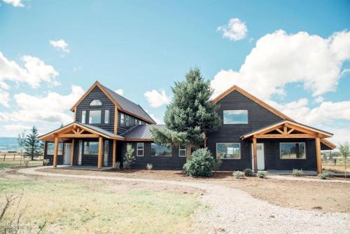 Spacious Farmhouse Estate with Mountain Views & Dual Kitchens near Skiing and Trails in Tetonia, Idaho