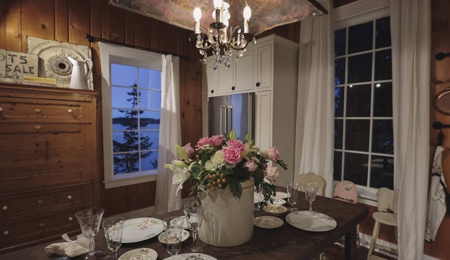 Storybook family cottage perched atop Penn Cove