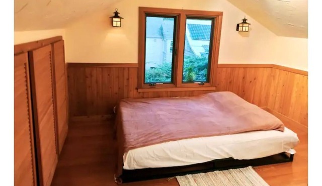 The Rose master bedroom at the Wisteria Cottage