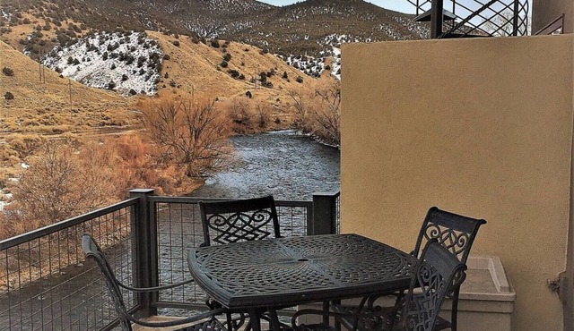 This riverfront downtown condo boasts and open floor plan for kitchen, living room, and dining areas. Or step onto the balcony over the Arkansas River to hear the water rushing by. Oversized master suite has its own balcony and indoor sitting area.