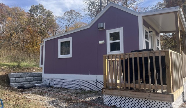 Tiny home studio with kitchenette, grill and front porch