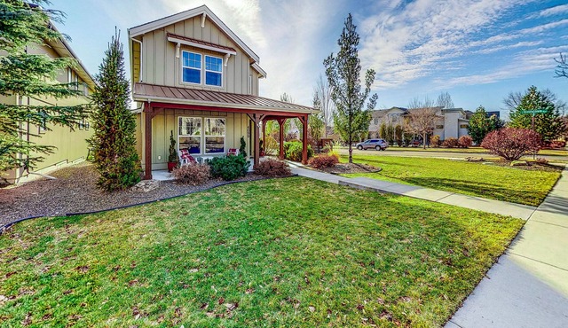 Updated home on corner lot with fireplace, private patio, grill & quiet location