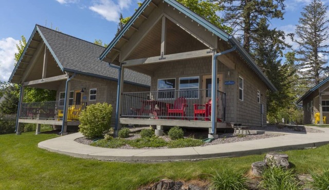 Watch golden sunsets and unwind in style at this romantic lakefront bungalow on Lake Pend Oreille