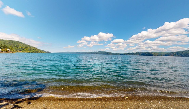Waterfront, dog-friendly home with amazing scenery, private beach & decks