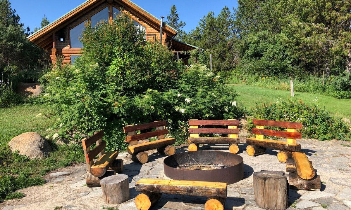 Tamarack Resort Cabin | Gorgeous log cabin w/ hot tub & pond on 5 acres.