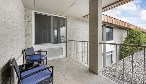 Suite, 1 King Bed, Refrigerator & Microwave, Courtyard View (with Sofabed)