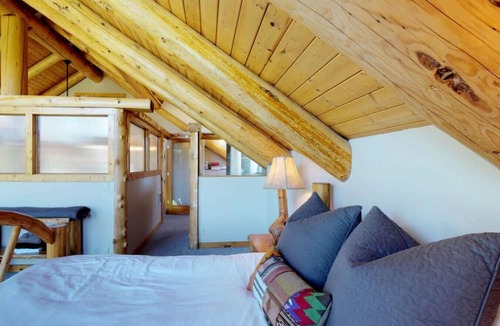 Tamarack Resort Cabin | Gorgeous log cabin w/ hot tub & pond on 5 acres.
