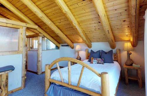Tamarack Resort Cabin | Gorgeous log cabin w/ hot tub & pond on 5 acres.