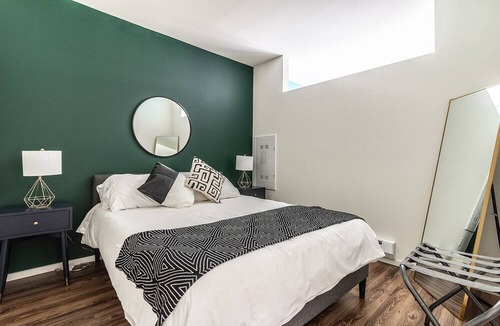 Mercer Island Apartment | Chic Mercer island Urban Bedrooms w/ Gym & Roof deck
