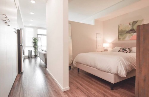 Mercer Island Apartment | Chic Mercer island Urban Bedrooms w/ Gym & Roof deck