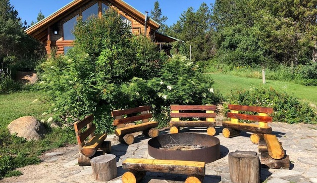 Gorgeous log cabin w/ hot tub & pond on 5 acres.