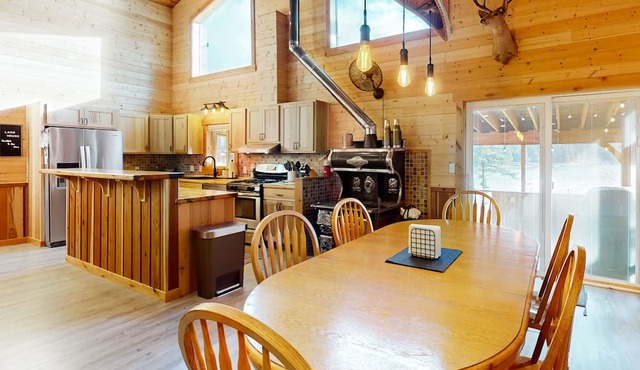 Waterfront custom-built home with screened-in porch & gas fireplace
